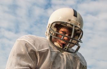 Child Playing Football